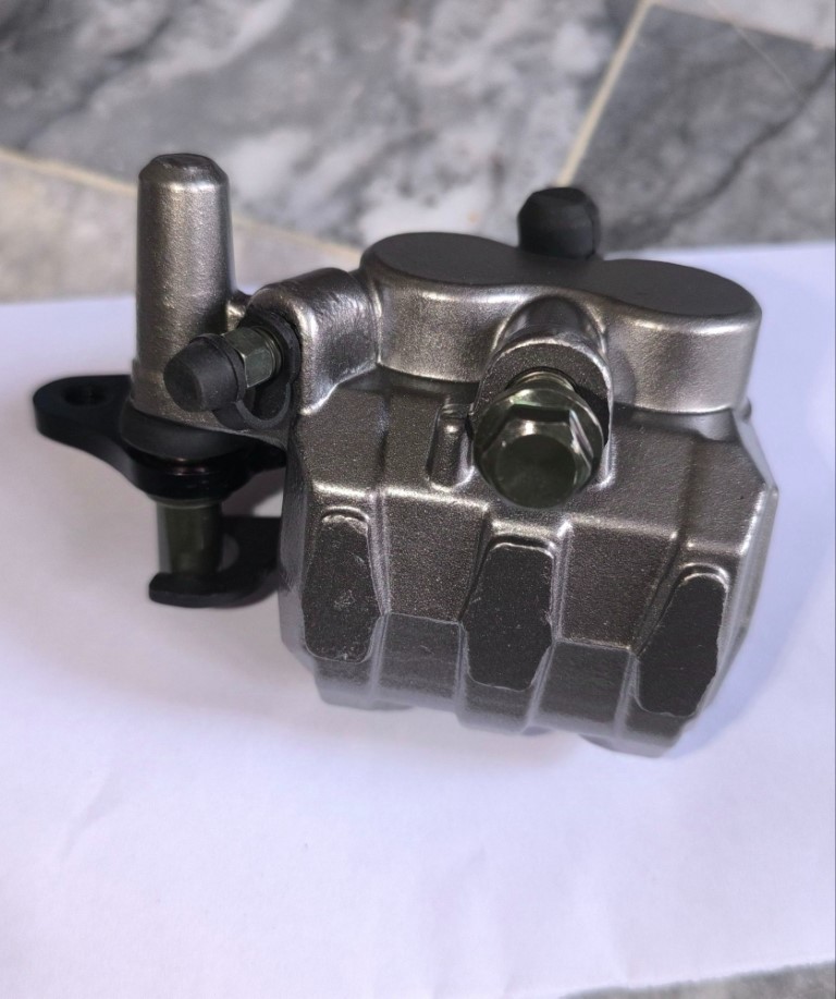 Honda Deluxe 125 Disk Brake Caliper